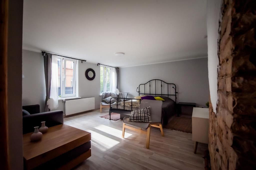 Postel nebo postele na pokoji v ubytování Cosy 2-room apartment near the city centre