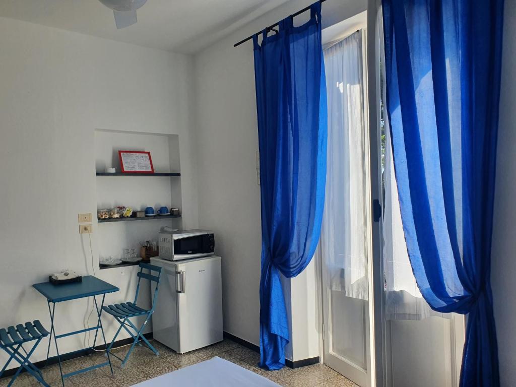 Kuchyň nebo kuchyňský kout v ubytování Hotel Zoagli
