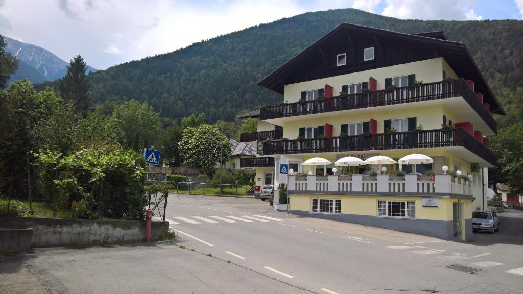 a large building on the side of a road at Hotel Krone in Morter