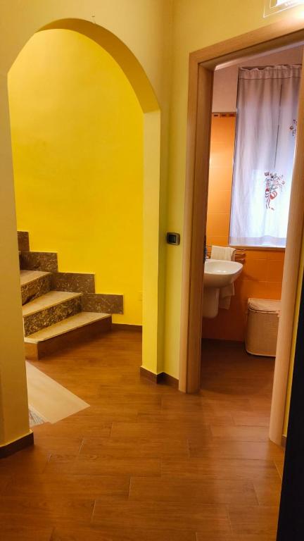 Postel nebo postele na pokoji v ubytování CASA SOPRANO da Anita