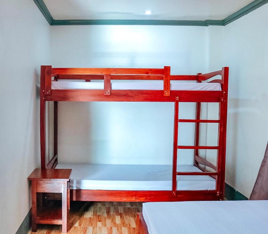 Postel nebo postele na pokoji v ubytování Airport View Hotel Vigan