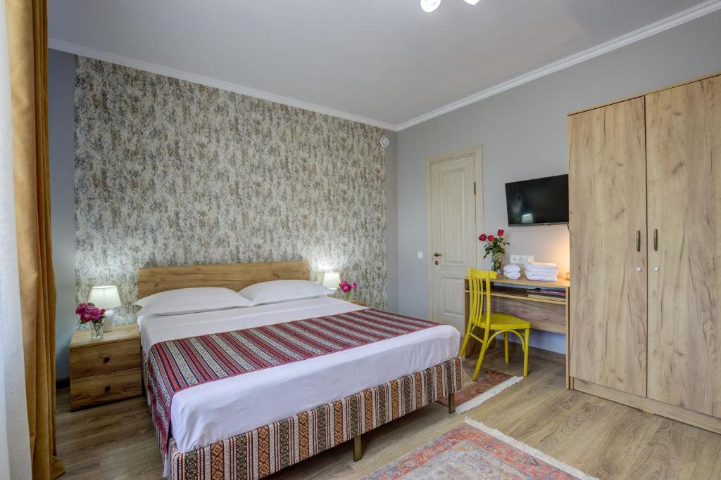 Кровать или кровати в номере Ordo Hotel