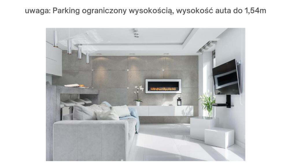 Televízia a/alebo spoločenská miestnosť v ubytovaní Elite Apartments Prestige Old Town