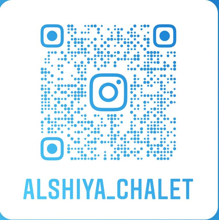 a close up of a camera with the alikina chaldrient text at Al Shiya Chalet in Sur