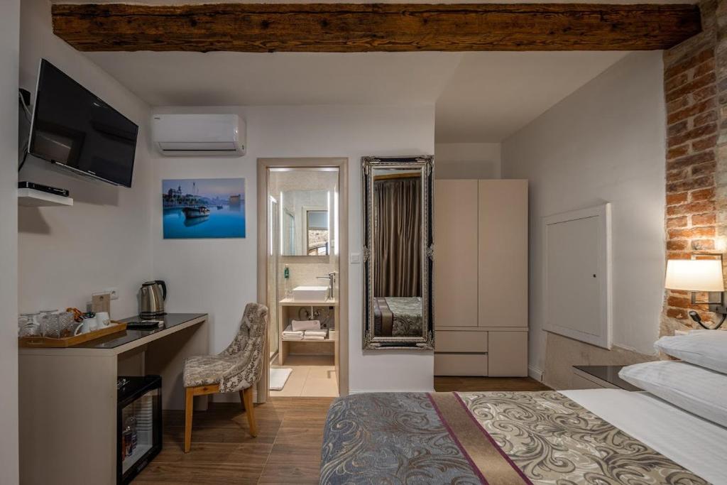 TV a/nebo společenská místnost v ubytování Hotel Agava Split