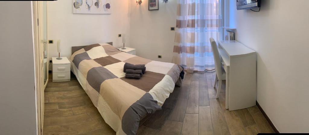 Posteľ alebo postele v izbe v ubytovaní Pasqualina's House
