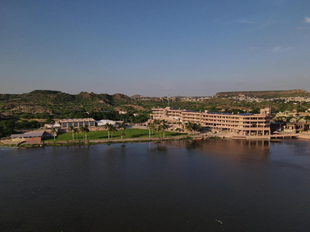 an aerial view of a resort with a large body of water at Lake View Hotel and Resort in Jodhpur