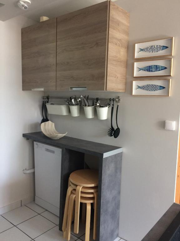 Kuchyňa alebo kuchynka v ubytovaní La courtine Etretat maison de pêcheur 2 mn de la mer