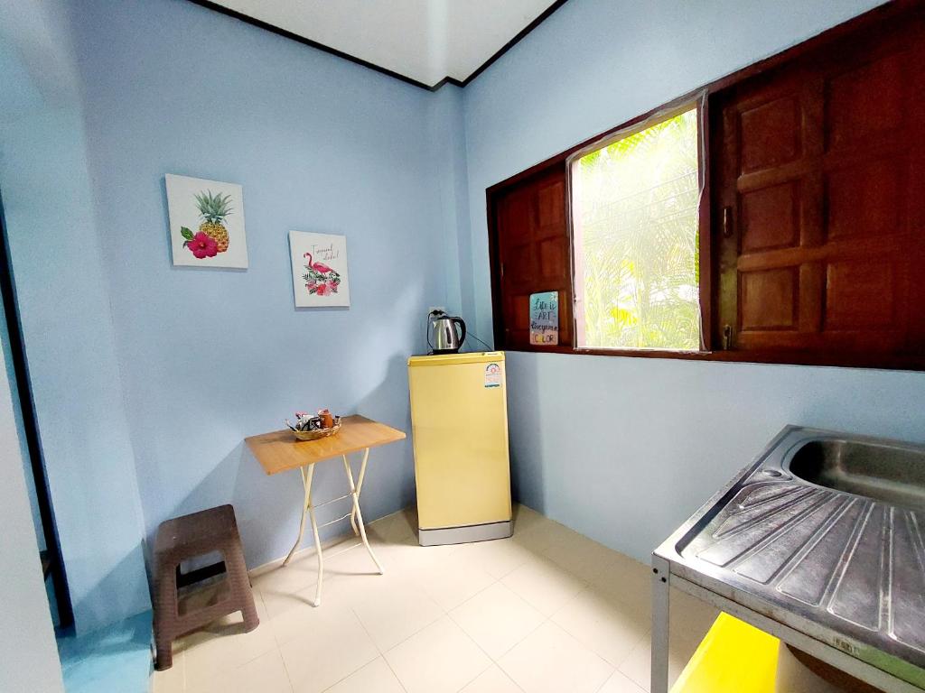 Postel nebo postele na pokoji v ubytování Papaya Cottage Koh Chang