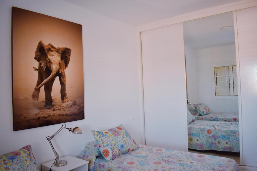Postel nebo postele na pokoji v ubytování Duplex en Meloneras