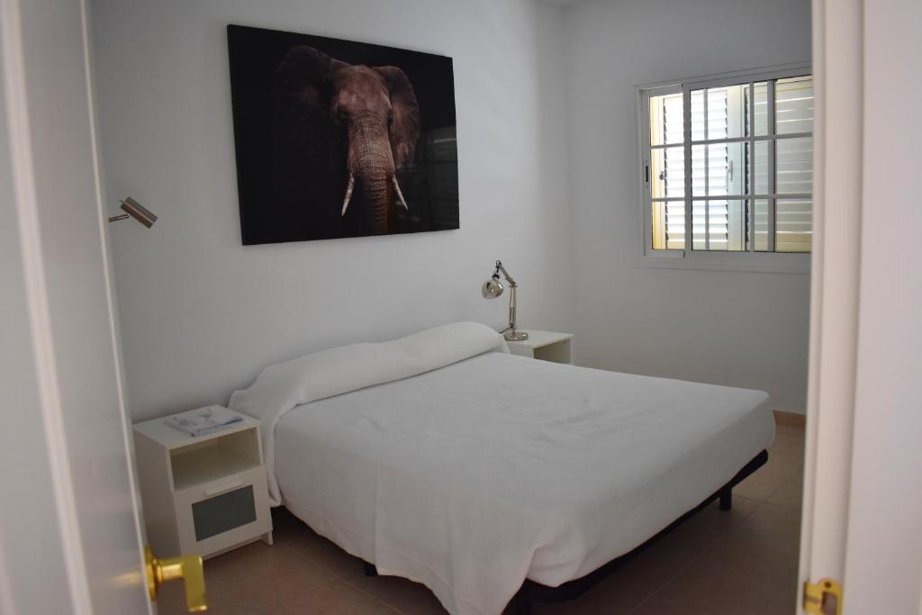 Postel nebo postele na pokoji v ubytování Duplex en Meloneras