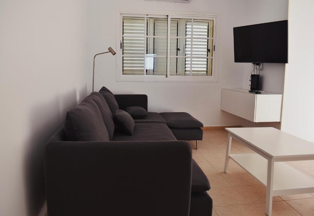 TV a/nebo společenská místnost v ubytování Duplex en Meloneras