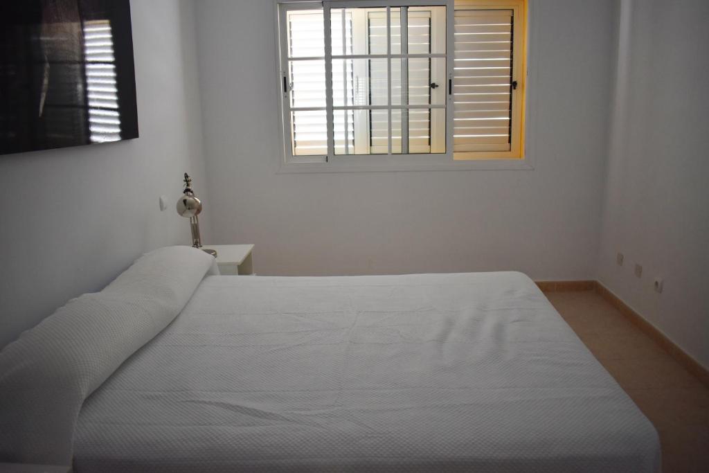 Postel nebo postele na pokoji v ubytování Duplex en Meloneras