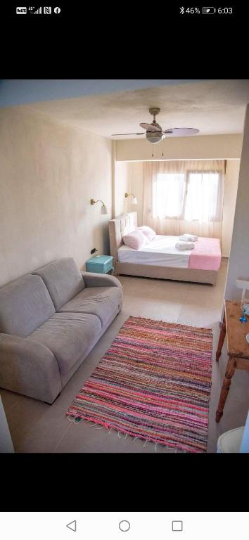 Postel nebo postele na pokoji v ubytování Zennova #61, Boutique Studio in Nikiti
