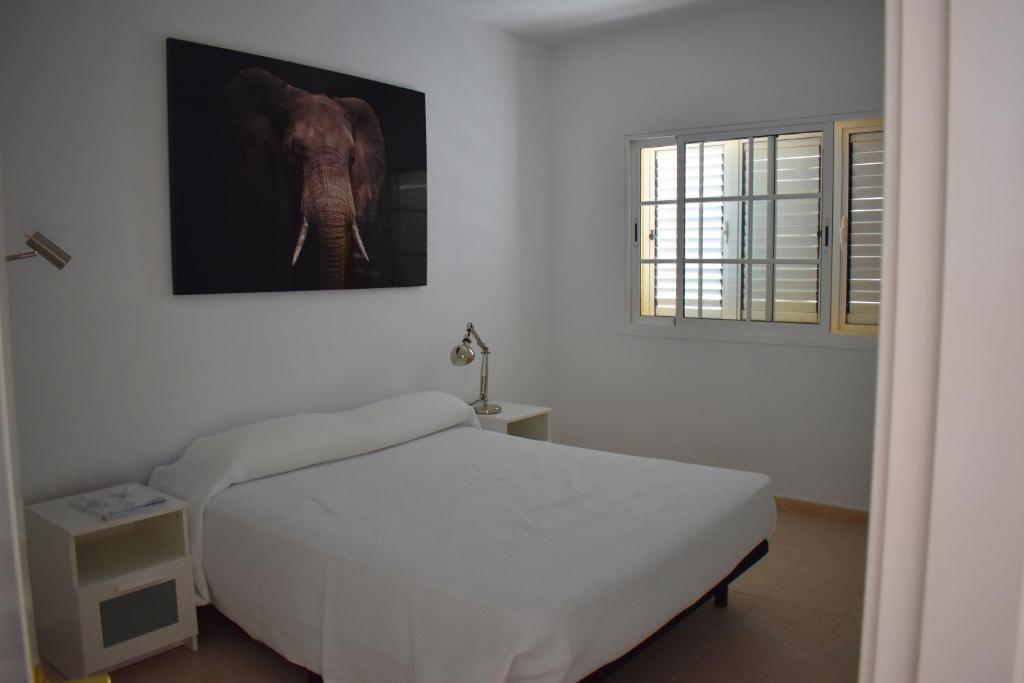 Postel nebo postele na pokoji v ubytování Duplex en Meloneras