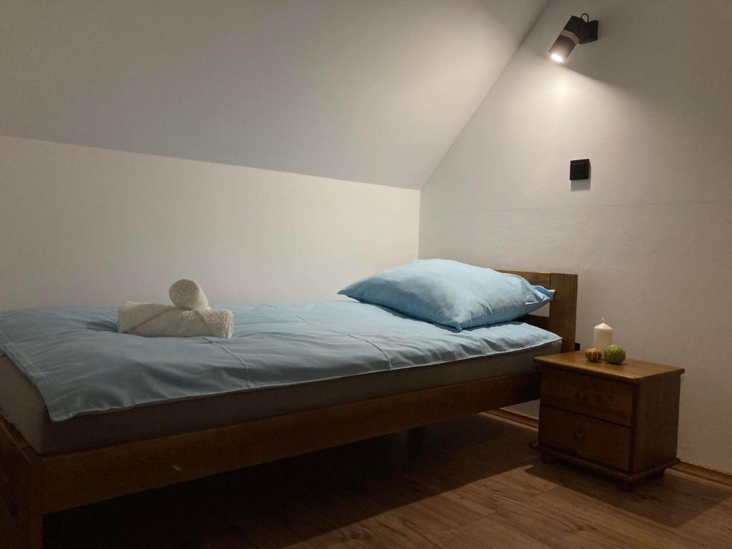 Postel nebo postele na pokoji v ubytování Agroturystyka u Podnóża Góry Cergowej