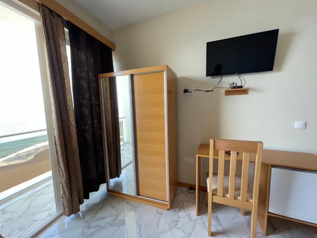 TV a/nebo společenská místnost v ubytování Cruzeiro Guest House