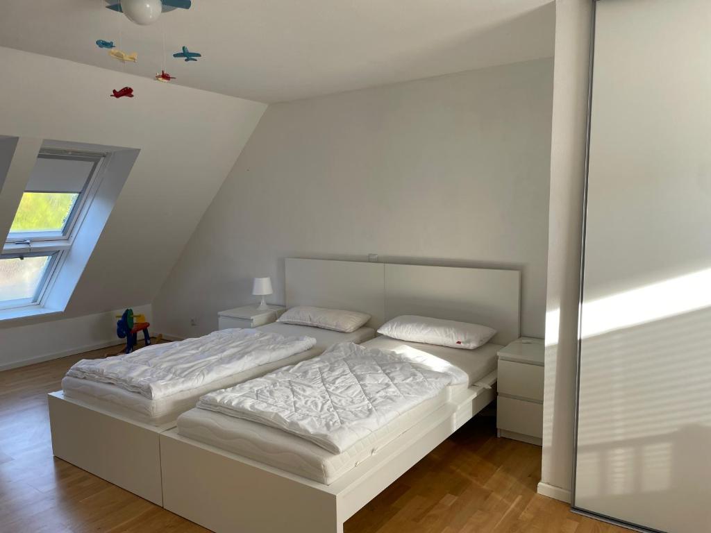 Postel nebo postele na pokoji v ubytování Ferienhaus Storchennest