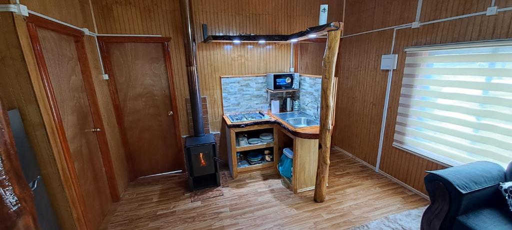 TV a/nebo společenská místnost v ubytování Cabañas camelia2