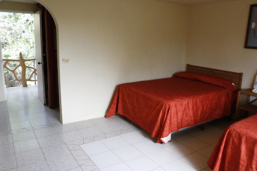Postel nebo postele na pokoji v ubytování Hotel Carrizal Spa