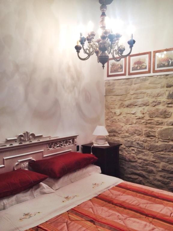Postel nebo postele na pokoji v ubytování Agriturismo Cailuca