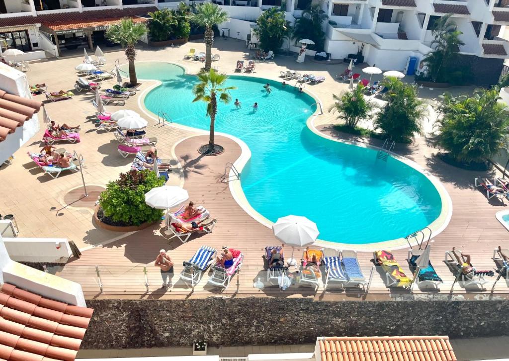 an overhead view of a swimming pool at a hotel at Sea View Penthouse with Large Terrace in Los Cristianos