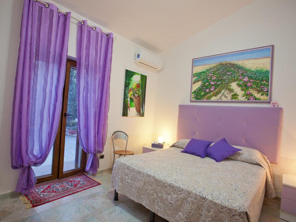 Postel nebo postele na pokoji v ubytování B&B Rosa podere 28