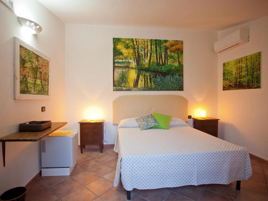 Postel nebo postele na pokoji v ubytování B&B Rosa podere 28
