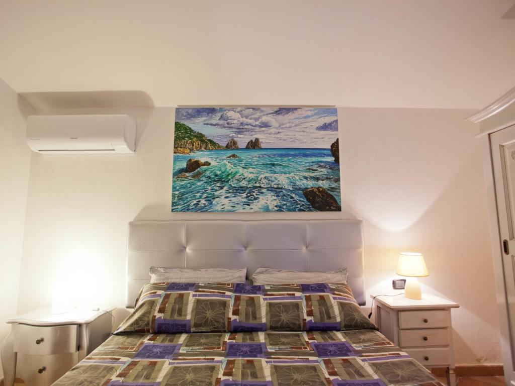 Postel nebo postele na pokoji v ubytování B&B Rosa podere 28