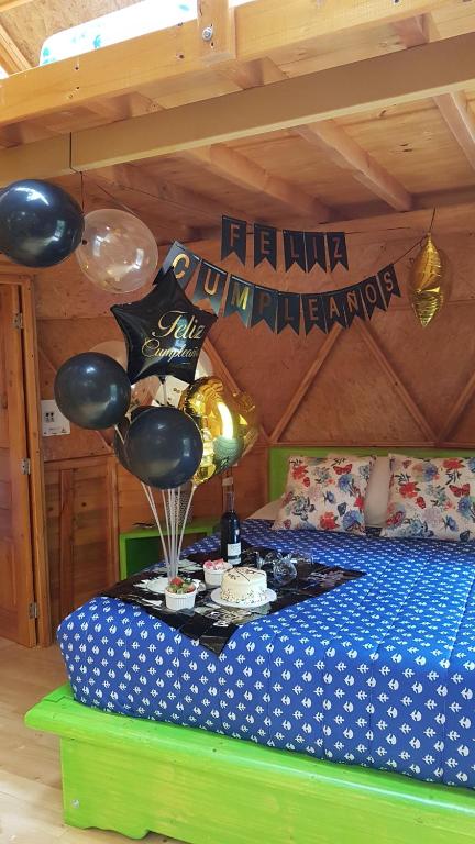 Rúm í herbergi á Domosup3rlopez - Glamping Petfriendly con Jacuzzi en Boyacá