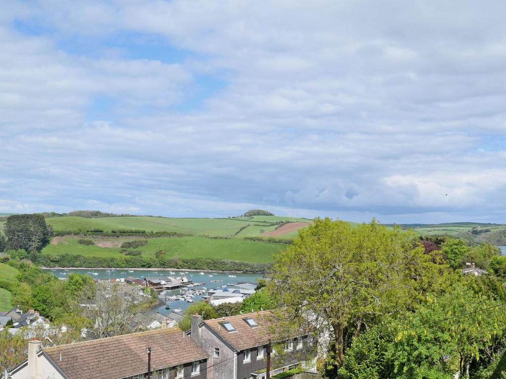 a view of a town with a river and houses at Rockmount 1 in Salcombe