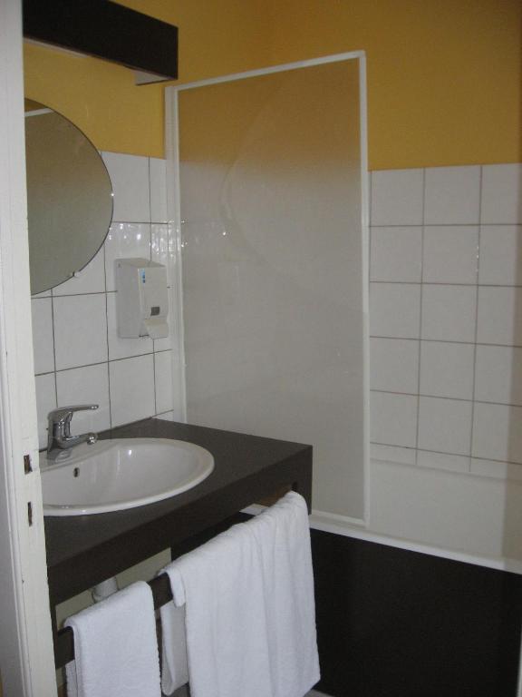 Koupelna v ubytování Hotel Napoléon