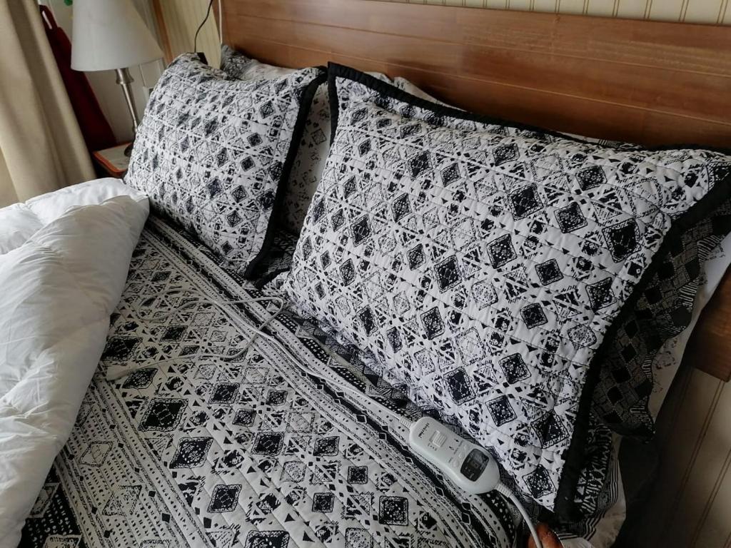 Una cama o camas en una habitación de Globertrotters