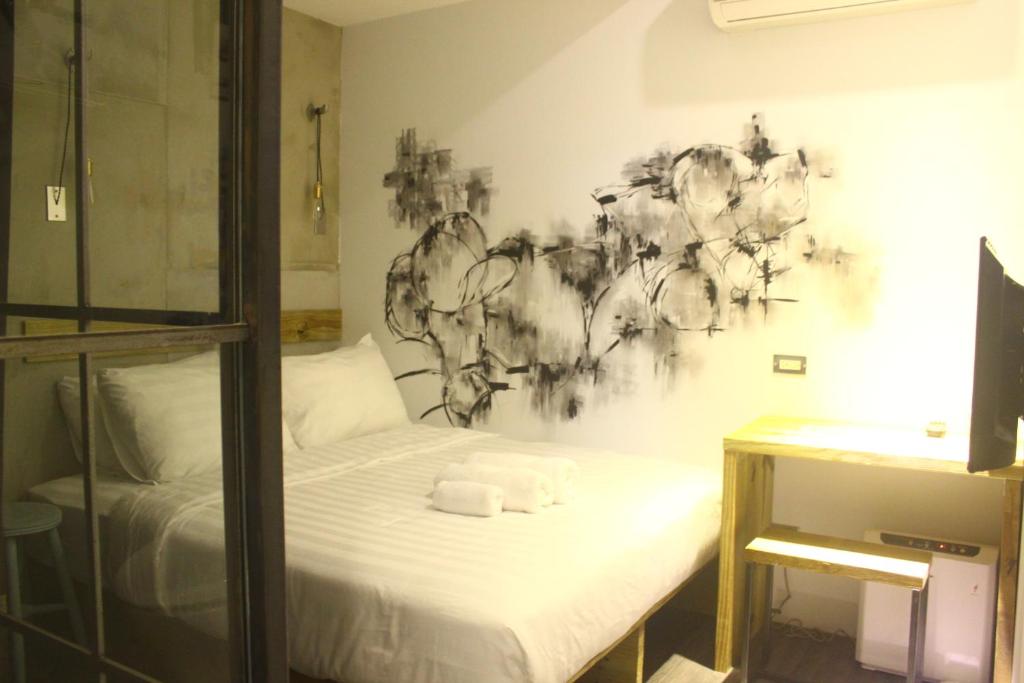 Postel nebo postele na pokoji v ubytování Just Inn 正旅館 台北車站