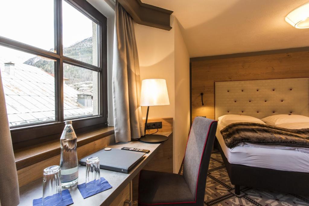 Postel nebo postele na pokoji v ubytování Hotel Valentin