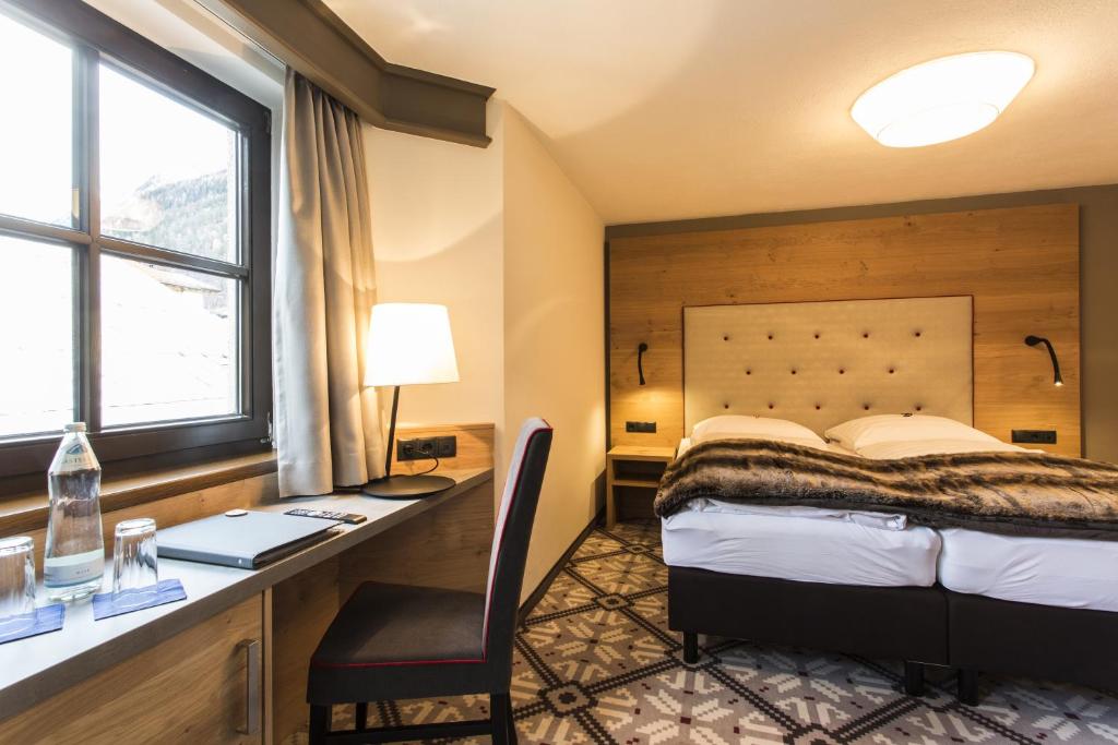 Postel nebo postele na pokoji v ubytování Hotel Valentin