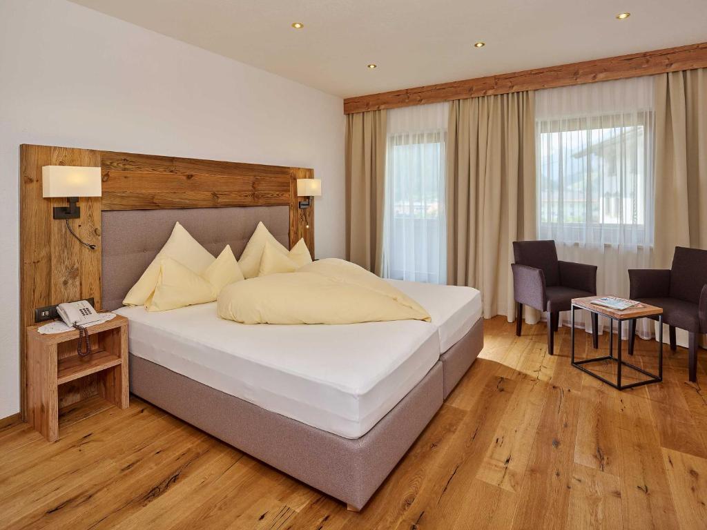 Postel nebo postele na pokoji v ubytování Hotel Sonnhof