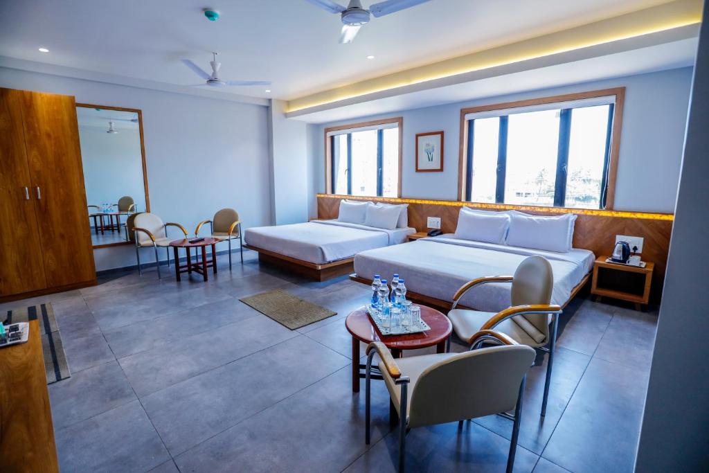 Postel nebo postele na pokoji v ubytování HOTEL OM
