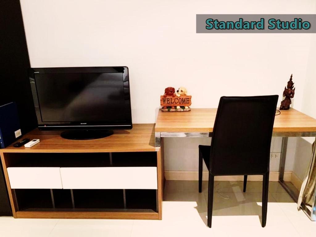 TV a/nebo společenská místnost v ubytování Jomtien Beach Penthouses Condo