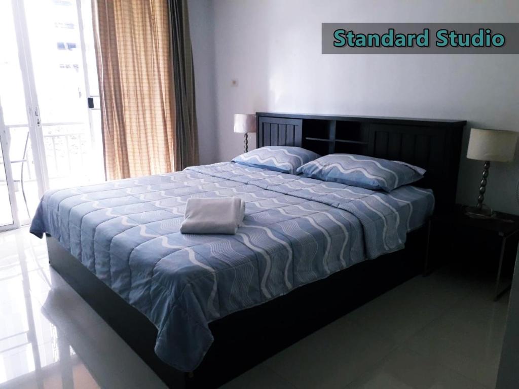 Postel nebo postele na pokoji v ubytování Jomtien Beach Penthouses Condo