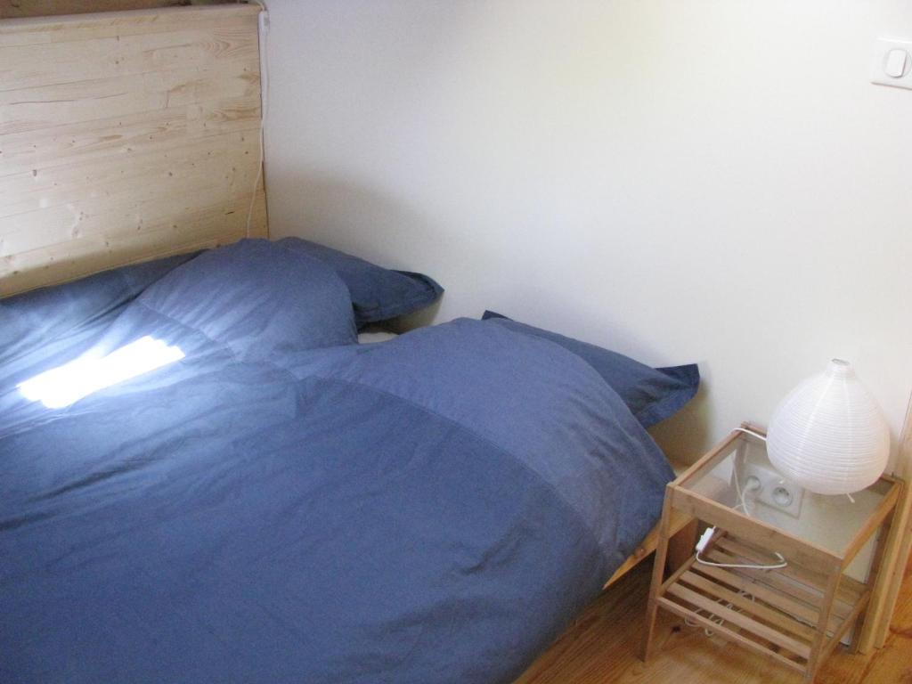 Postel nebo postele na pokoji v ubytování Domaine Audubert