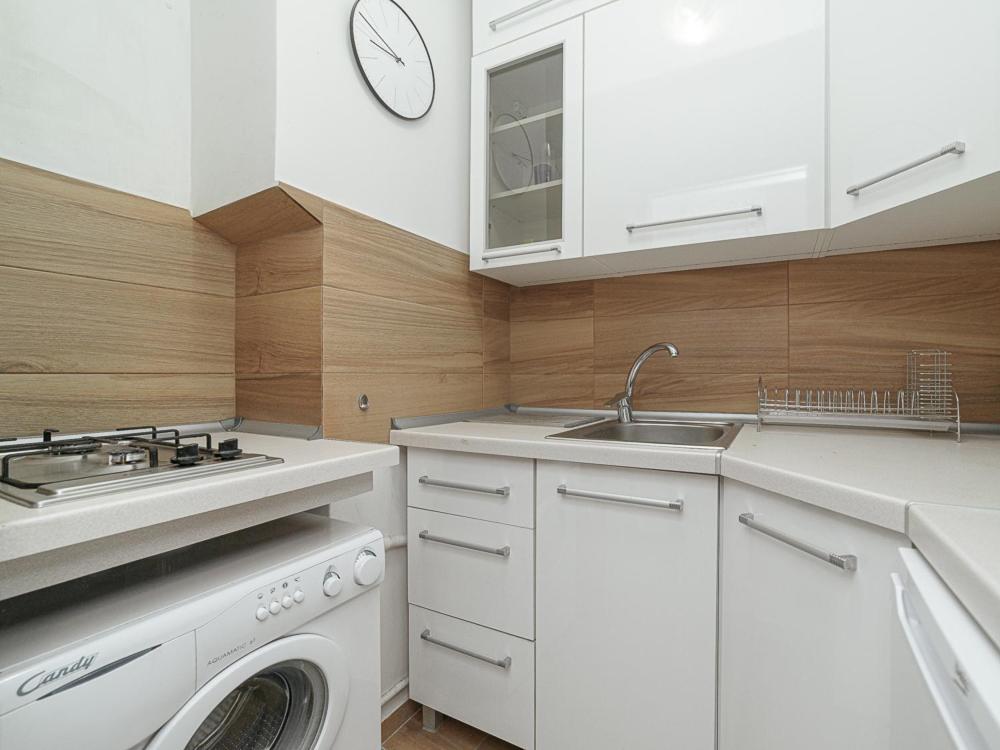Kuchyňa alebo kuchynka v ubytovaní Sliska 10 Apartament II
