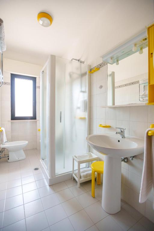 Koupelna v ubytování Hotel Astor