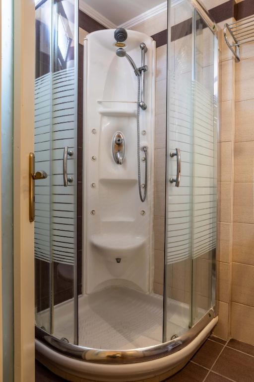 Koupelna v ubytování Hotel Serenity Tolo