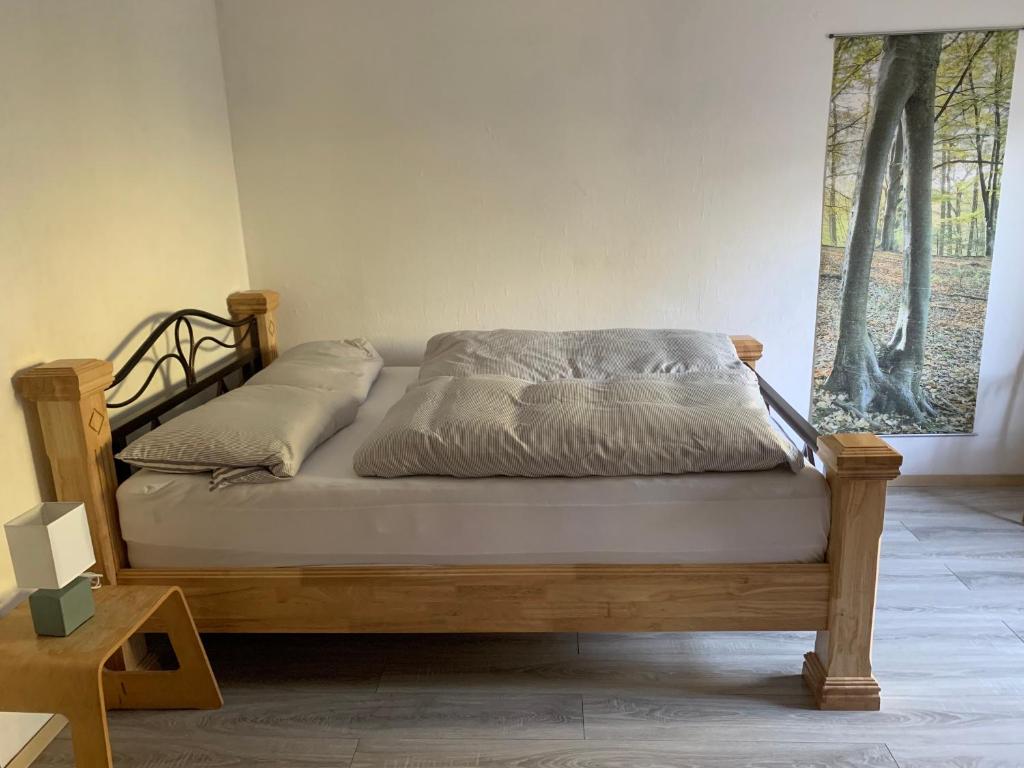 Postel nebo postele na pokoji v ubytování Eifeloase Sophia
