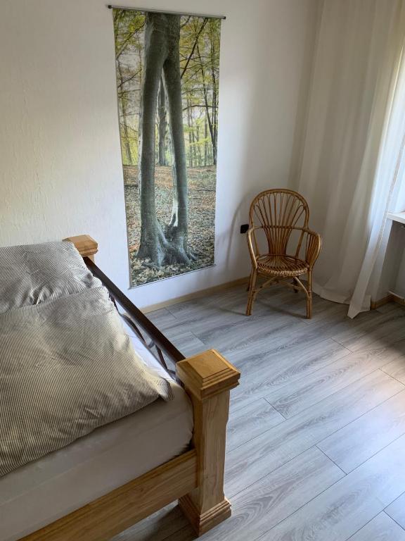 Postel nebo postele na pokoji v ubytování Eifeloase Sophia