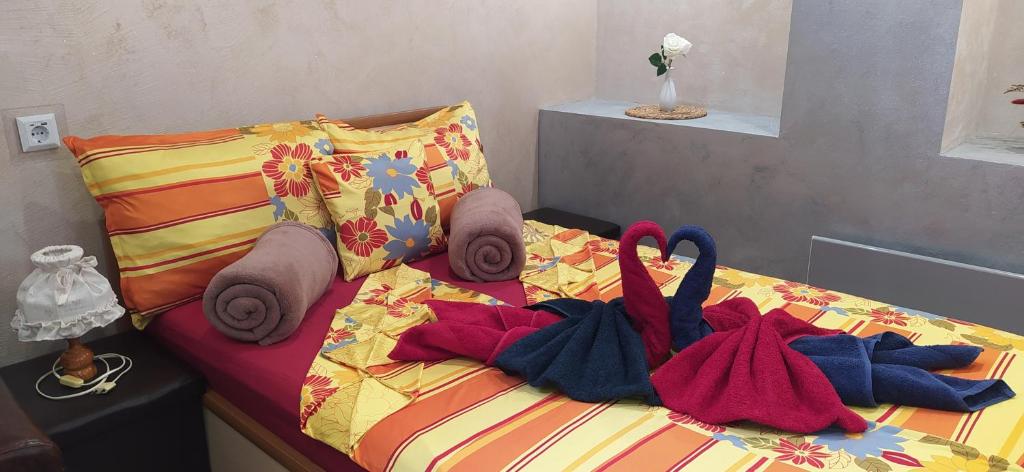 A bed or beds in a room at Velvita Sliven