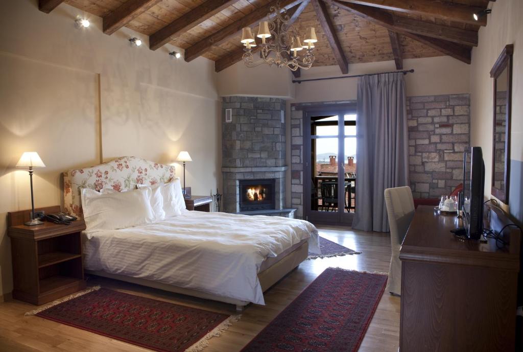Posteľ alebo postele v izbe v ubytovaní Kazarma Hotel