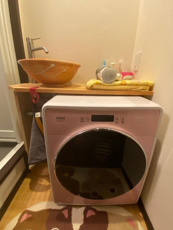 Fotografie z fotogalerie ubytování 澄心小筑 房东住一楼 客人住二楼 每天只接一组客人 雄琴车站免费接送 提供一台免费停车位 v destinaci Ocu