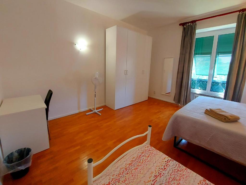 Postel nebo postele na pokoji v ubytování La dulce stanza